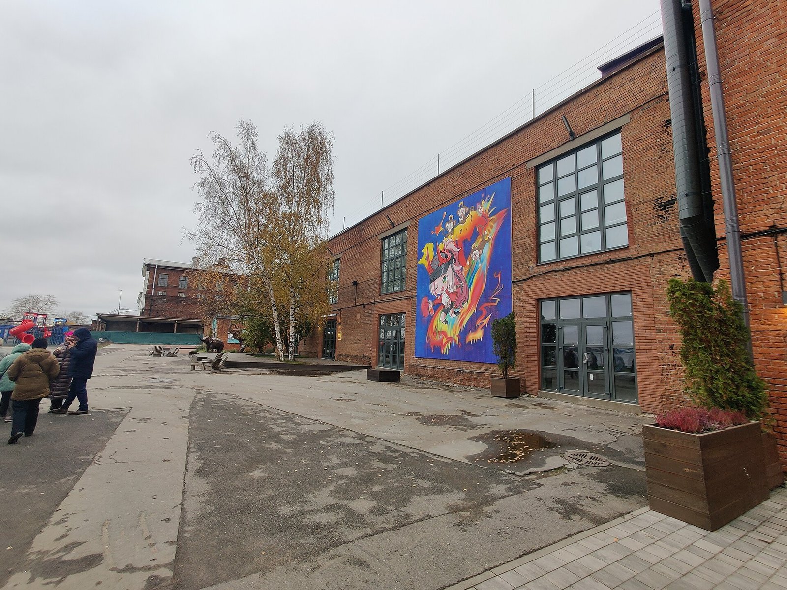 Brick buildings and street art in the Brusnitsyn quarter in autumn