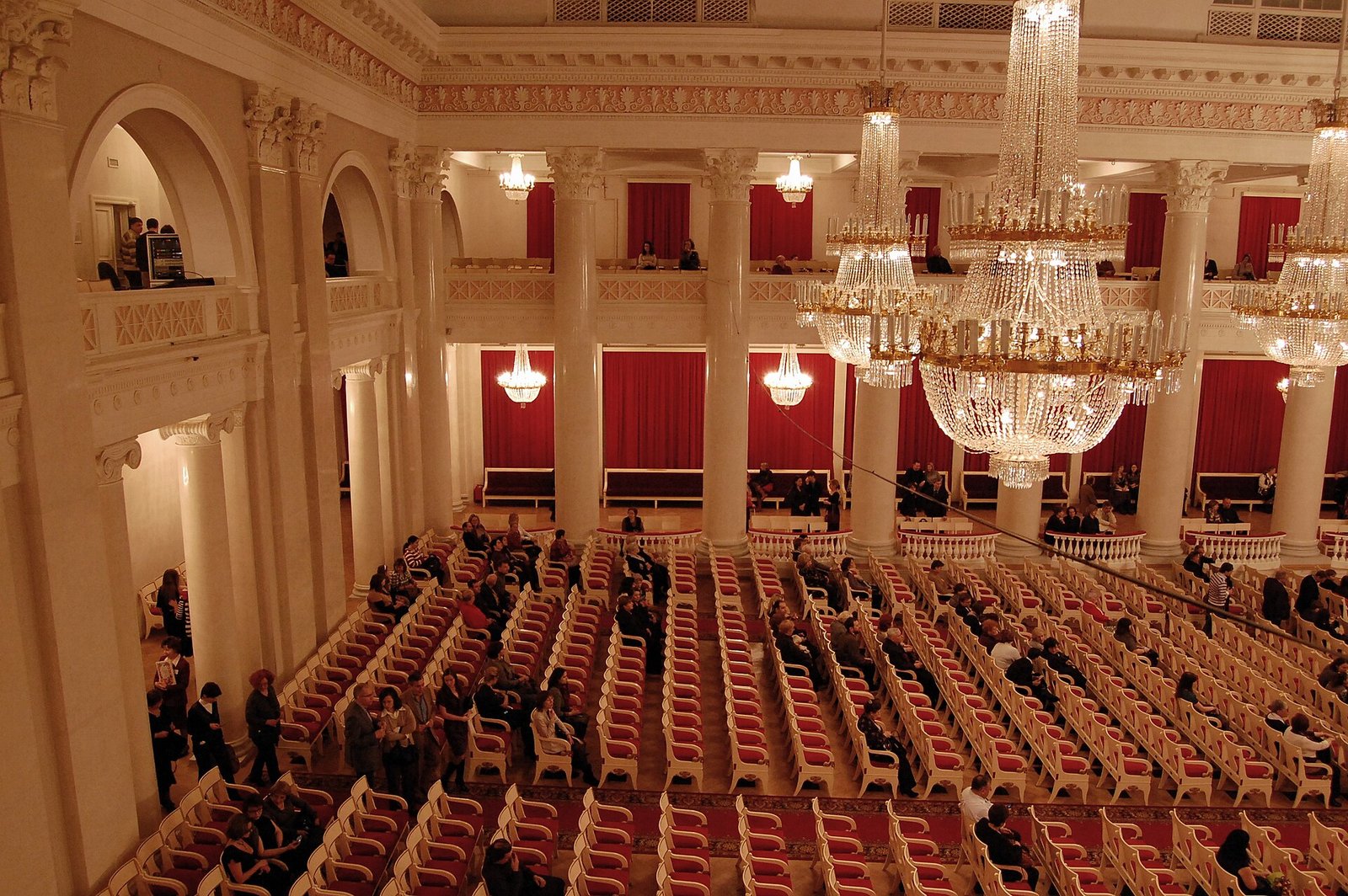 The Philharmonia's Grand Hall before a concert: stalls, colonnade and crystal chandeliers