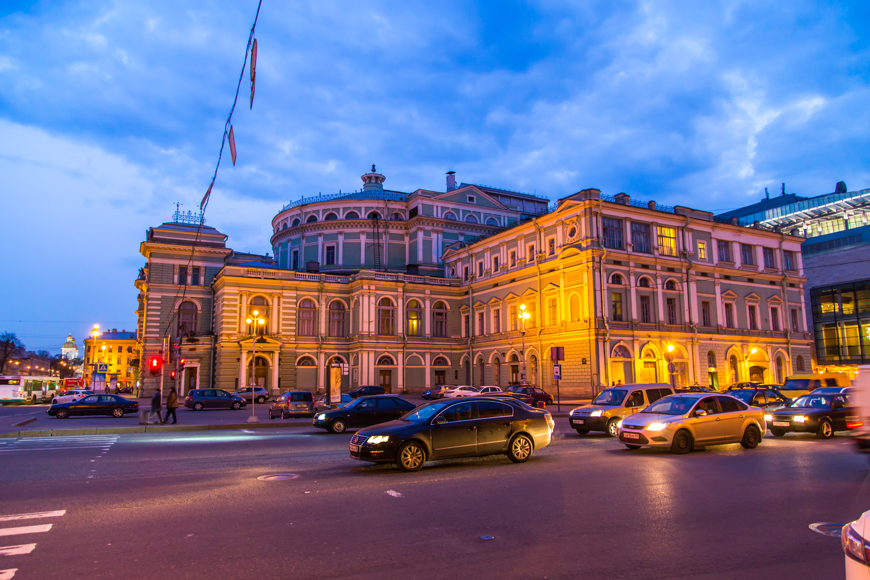 The historic Mariinsky Theatre building on Teatralnaya Square in the evening, with Mariinsky II visible on the right
