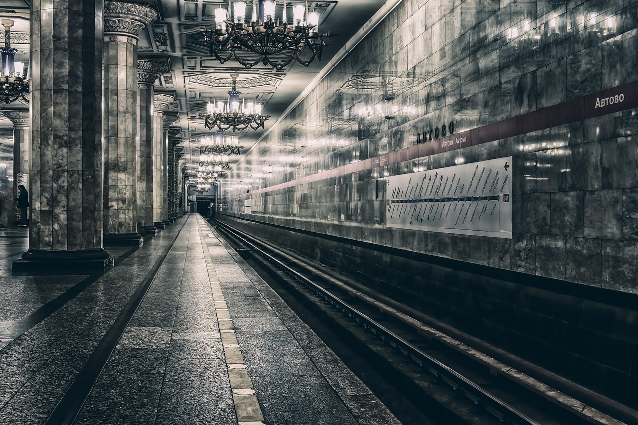 Avtovo metro station platform with marble columns and chandeliers in St Petersburg